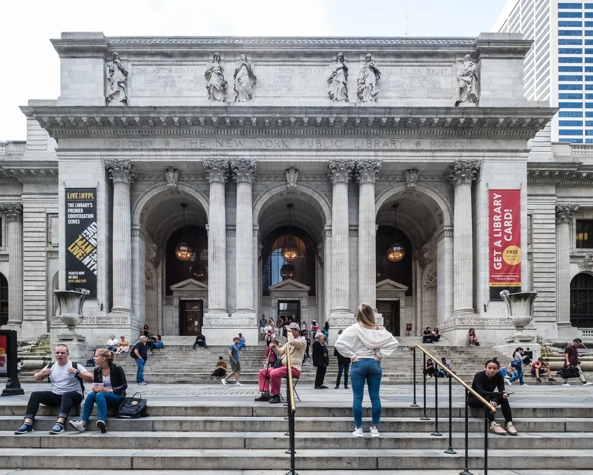 The Fifth Avenue facade and steps of the New York Public Library's Schwarzman Building, a stop on a New York architecture tour