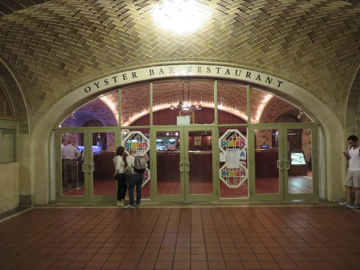 The tiled vaulted entrance of the Oyster Bar restaurant in Grand Central Terminal, on a New York architecture tour