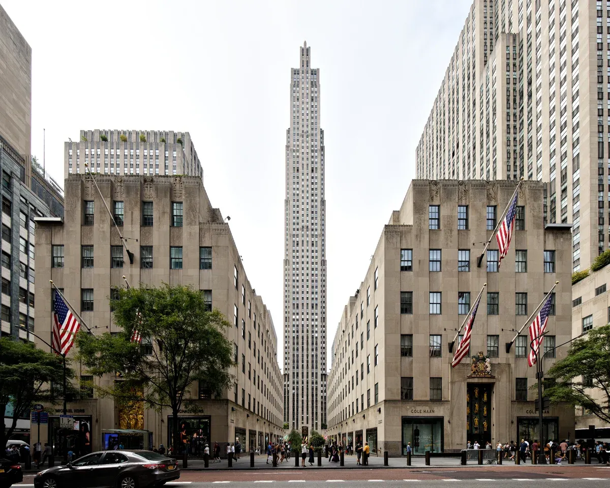 30 Rockefeller Plaza rising between two lower buildings as seen from Fifth Avenue, on a New York architecture tour